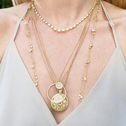 ideal topper to your diamond neck stacks<br>(bezel-set, graduated diamonds cousin shown) <span class='visuallyhidden'>Call, text 323-404-2959 for shopping help.</span>